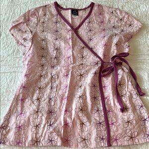 NWT. Women’s. Size S. Scrub top. Two pockets on side. Floral Wrap Top